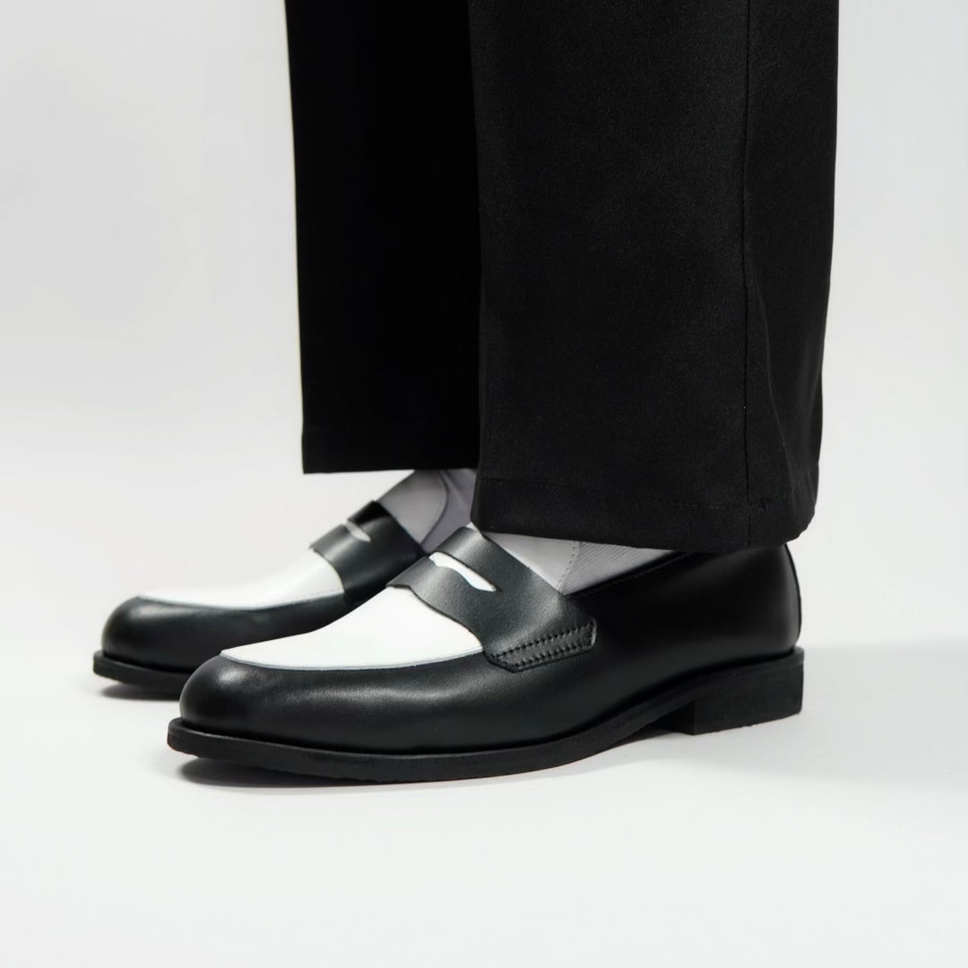 Dára black + white penny loafers