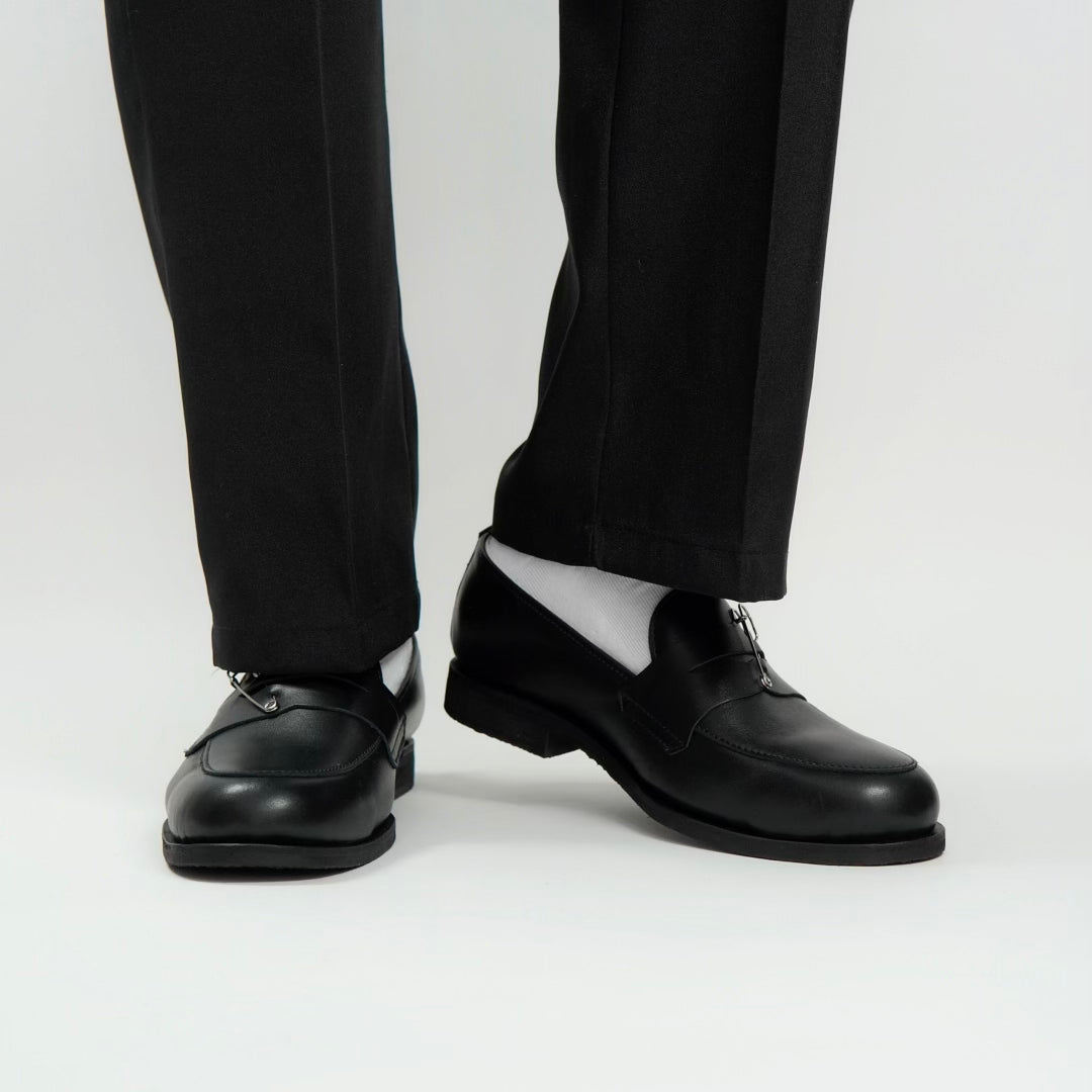 Dára black pin penny loafers