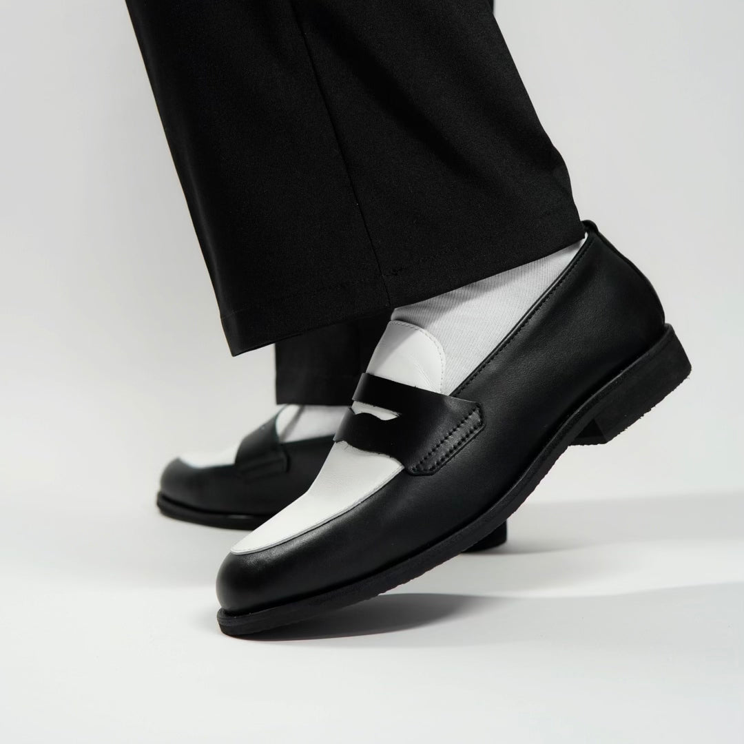 Dára black + white penny loafers